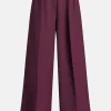 Lou High Waisted Flared Wool Trousers in Burgundy