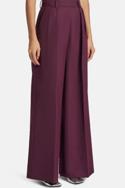 Lou High Waisted Flared Wool Trousers in Burgundy