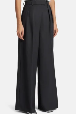 Lou High Waisted Flared Wool Trousers in Black