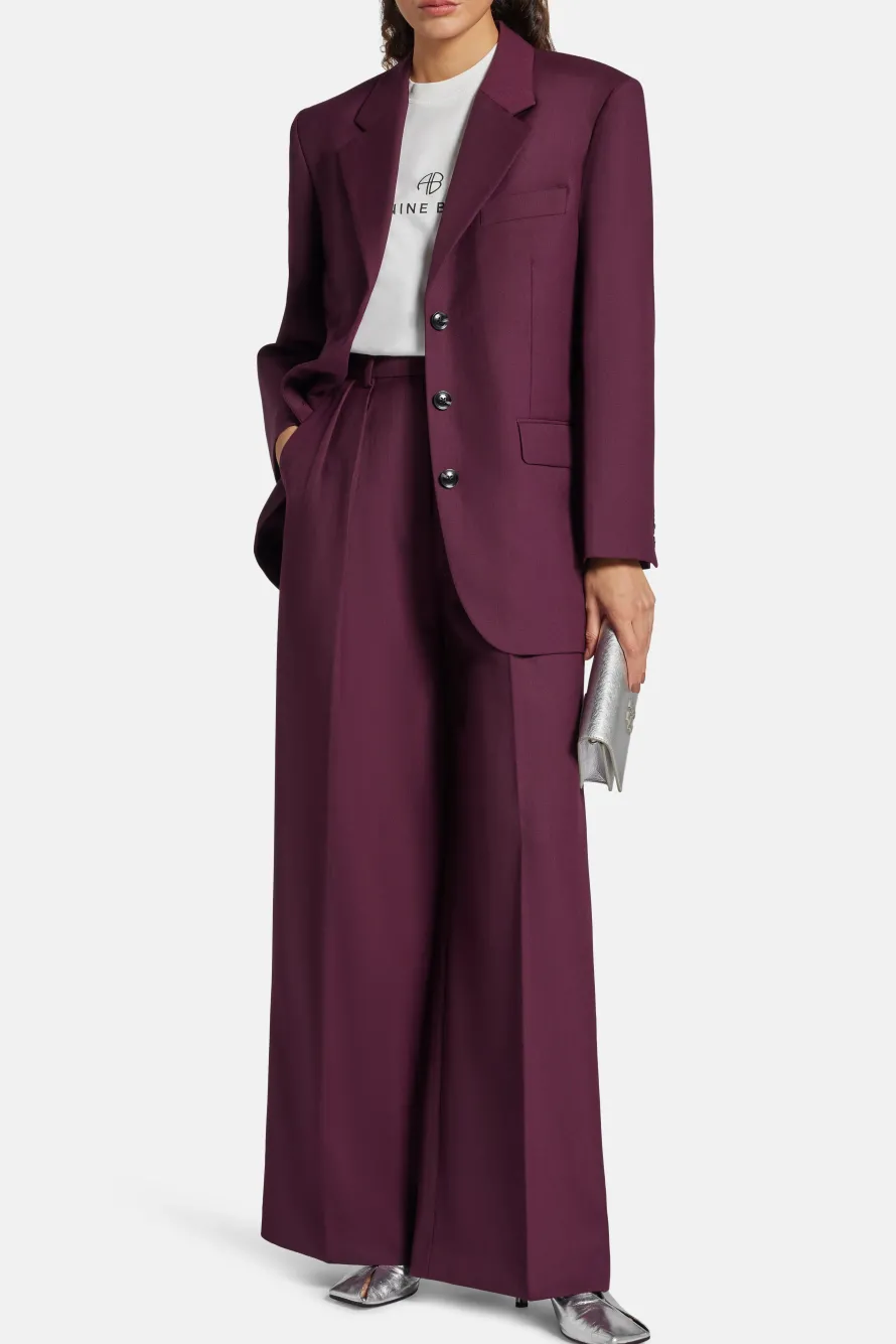 Lou High Waisted Flared Wool Trousers in Burgundy