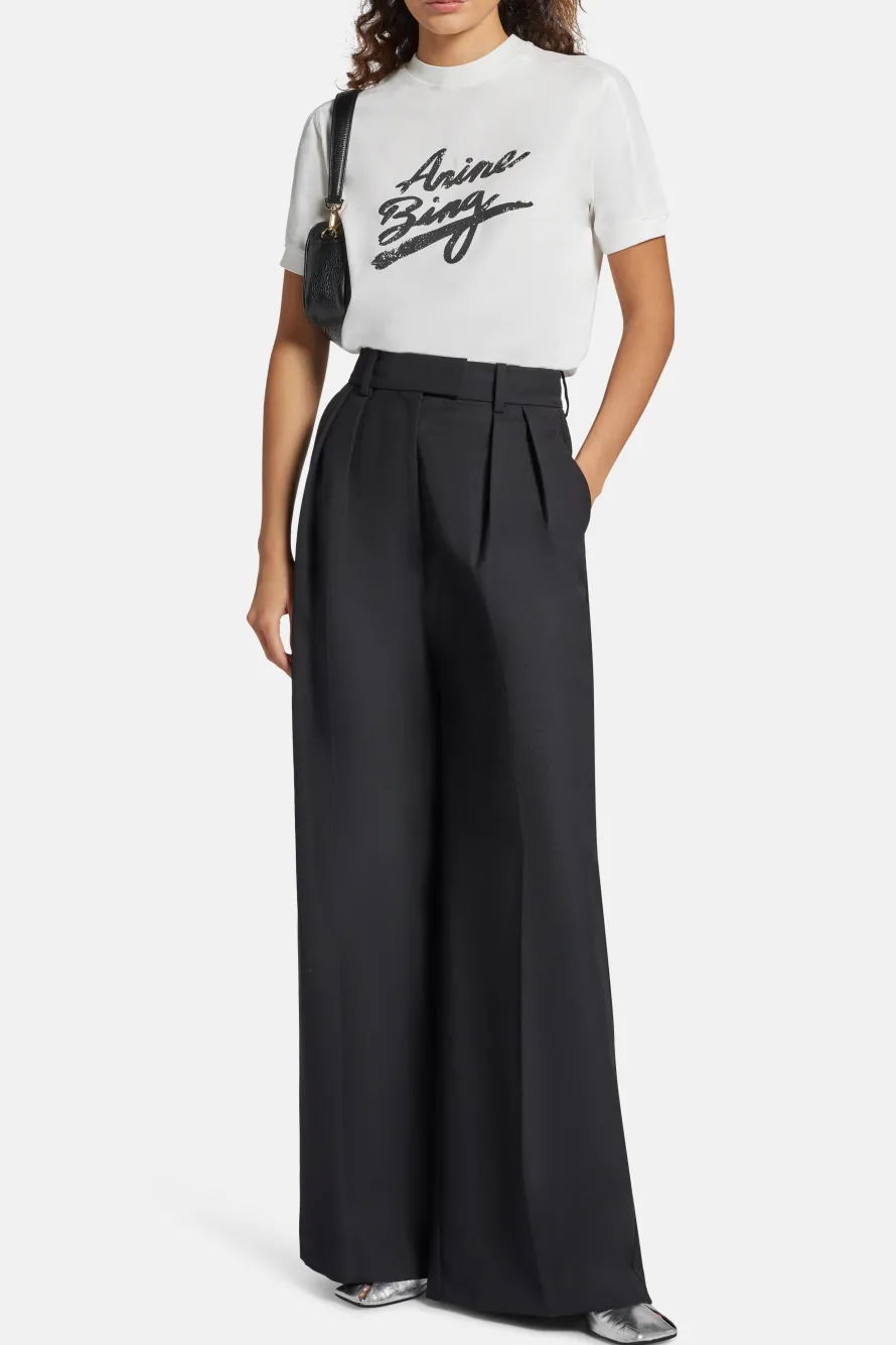 Lou High Waisted Flared Wool Trousers in Black