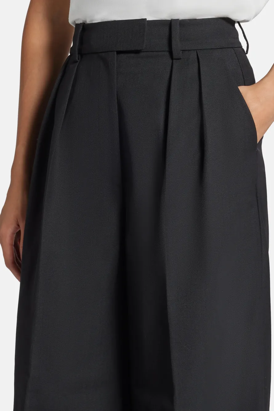 Lou High Waisted Flared Wool Trousers in Black