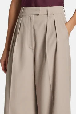 Lou High Waisted Flared Wool Trousers in Beige